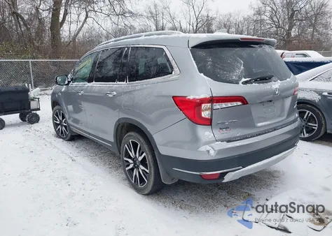 2019 Honda Pilot Touring z USA, uszkodzony, nr VIN 5FNYF6H62KB090155